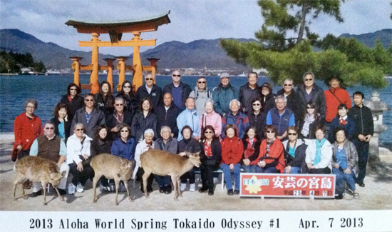 Tour members gather for a group photo on Miyajima Island.
