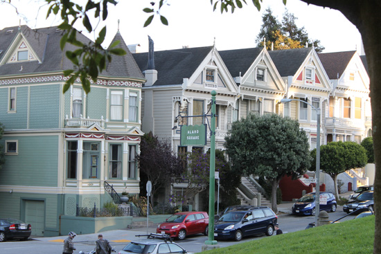 Alamo Square is known for four Victorian style homes fronting the San Francisco skyline.